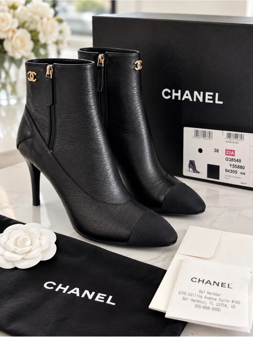 CHANEL Black Leather Ankle Booties with Black Cap Toe and Gold CC